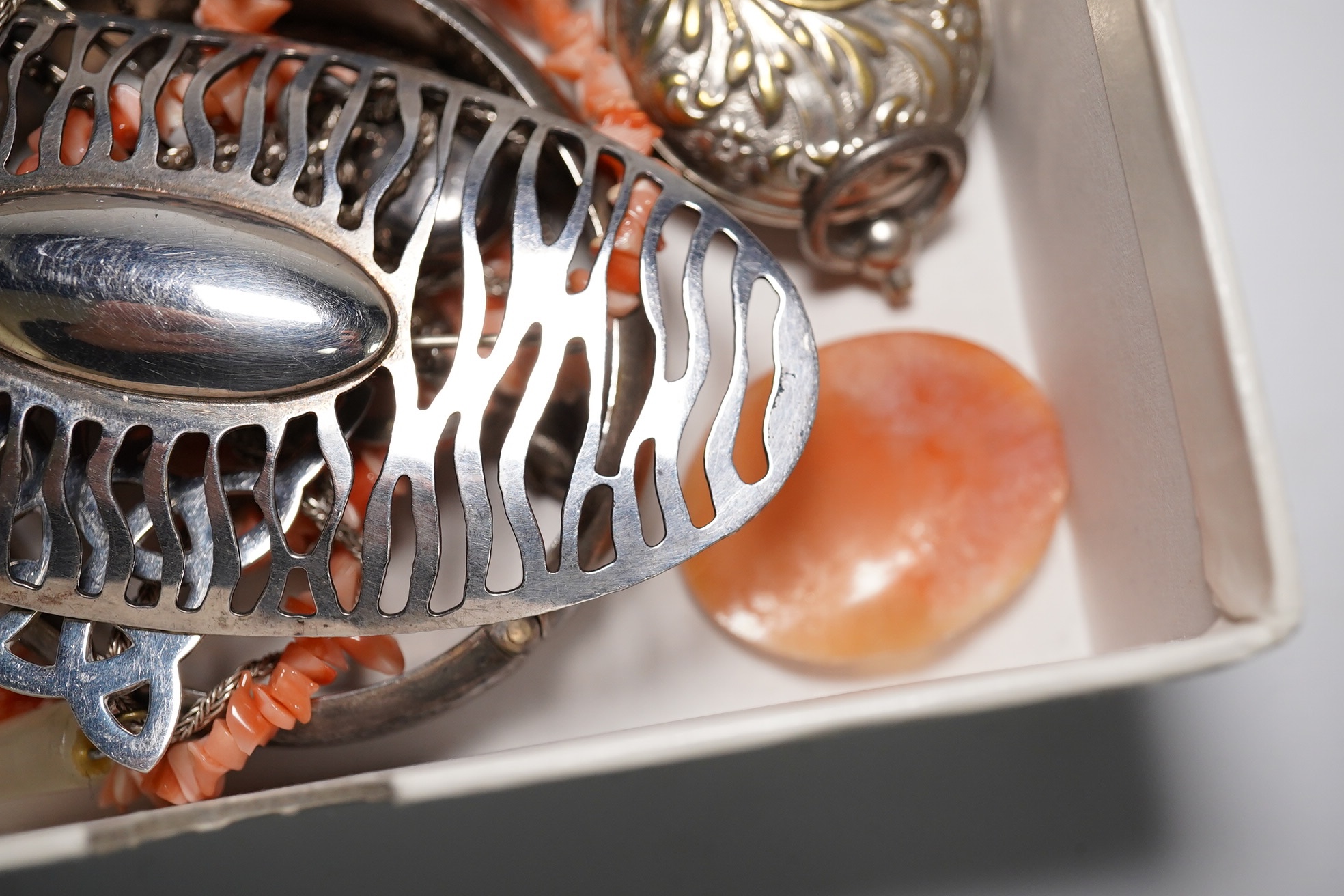 Assorted silver and jewellery including hinged bangle, pendants, brooches etc. Condition - poor to fair